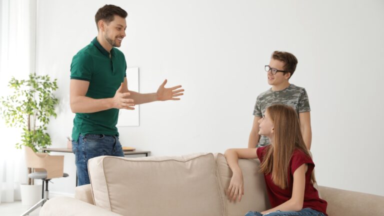 Mom says her twins pushed away the man who raised them when their deadbeat father came back — and months later she was still defending the choice to stand with her husband